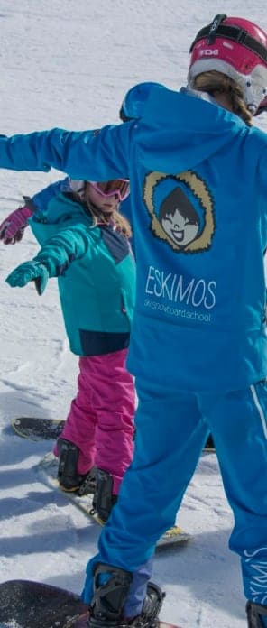 Placeholder: instructor with a young snowboarder