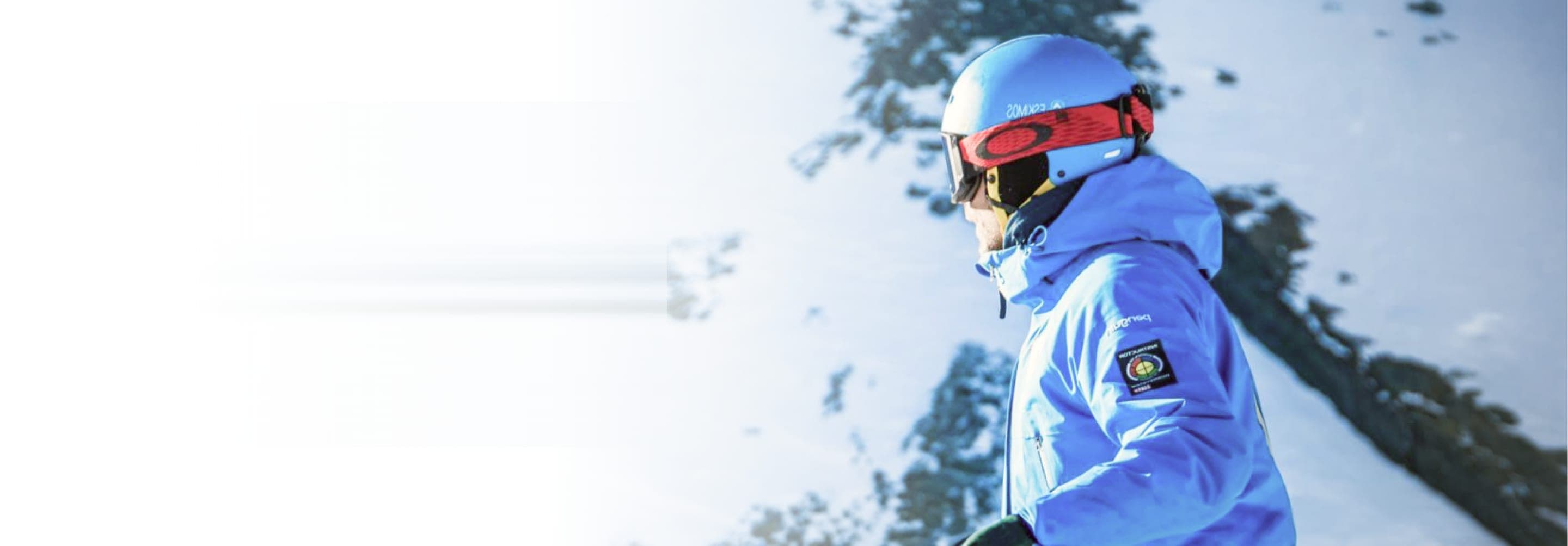 Placeholder: instructor with helmet and goggles